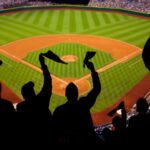 Baseball fans cheering together in a stadium, capturing a shared cultural moment.